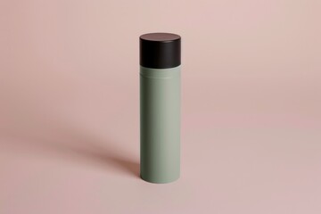 A mysterious green and black bottle stands out against a soft pink backdrop