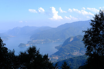 aerial view of Como Lake landscape in beautiful summer day, trees, water and mountains, Italy,...