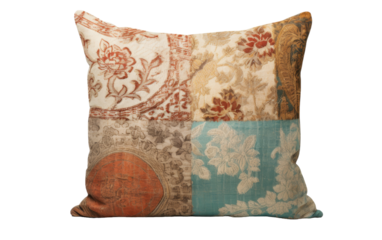 A colorful patchwork design covers a soft pillow, creating a cozy and eclectic look