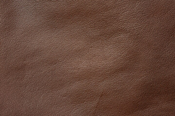 The background is brown genuine leather.