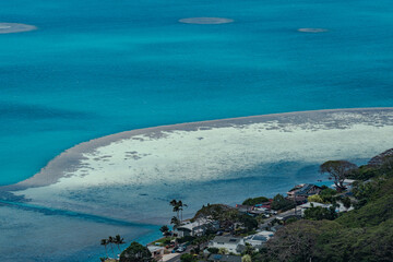 Reef . Kāneohe Bay, largest sheltered body of water in the main Hawaiian Islands. Pu'u Ma'eli'eli...