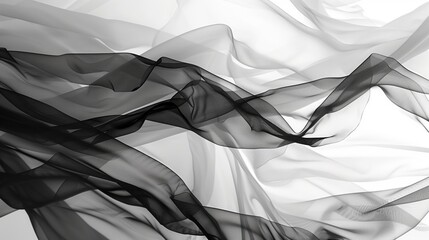 Fluttering chiffon and organza fabric in black and white. Translucent textiles with delicate movement.