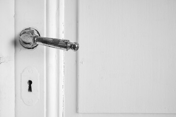Vintage White Door Handle and Lock Detail
