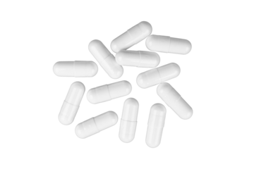 Scattered white medicine pill capsules isolated on white, transparent background. Antibiotics, supplement, vitamin, healthcare concept, pharmaceutical medicine