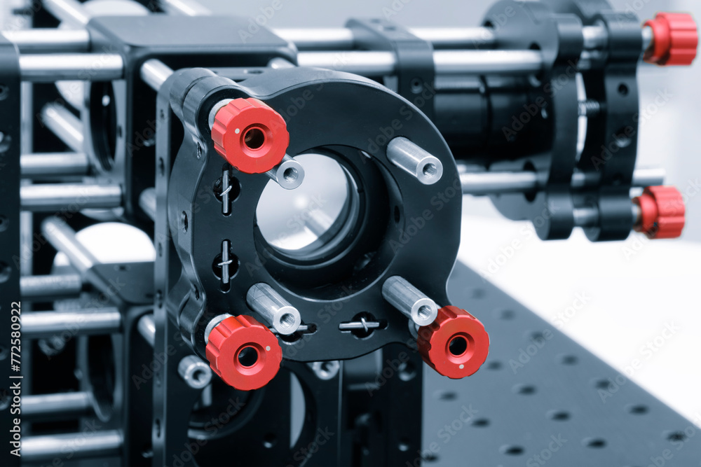 Leinwandbilder experiment with laser device in optical laboratory. experiment in optic lab with laser device.