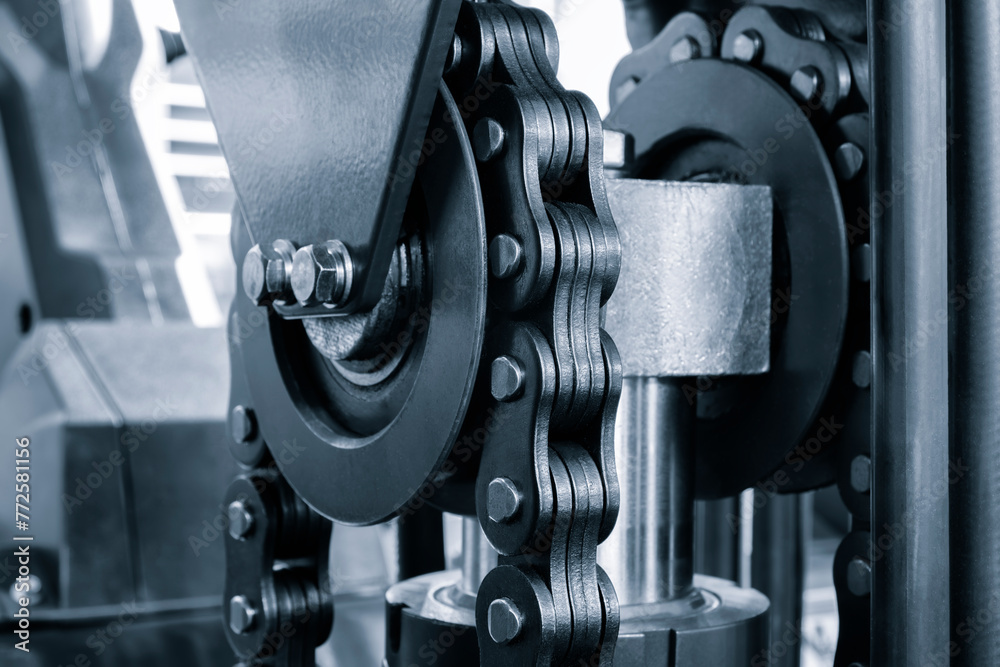 Poster a chain is shown in a black and silver color of warehouse forklift. the chain is made of metal and h