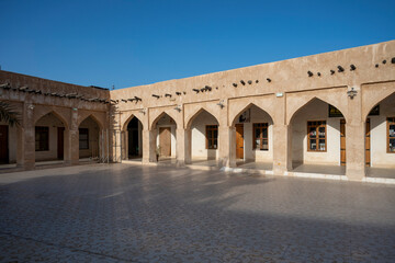 Wakra, Qatar - March 28, 2024: Old buildings architecture in the Wakrah souq (Traditional Market).