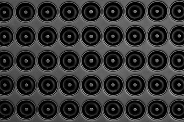 A black background of many circles of various sizes. The circles are all different sizes and are...