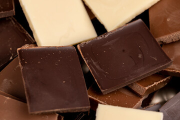 white, bitter and milk chocolate pieces