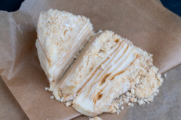 multi-layered cake made of buttercream and thin wheat cakes