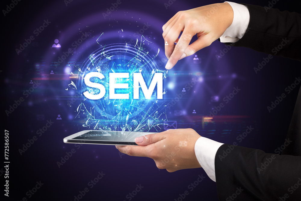 Poster close-up of a touchscreen with abbreviation.