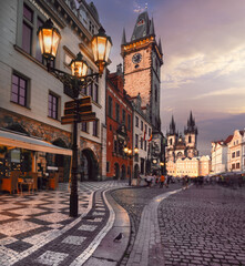Fototapeta na wymiar Twilight's Glow over the Old Town Hall and Tyn Church in Prague, Czechia