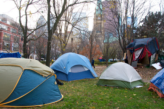 Sign in the downtown Toronto parks for the homeless as tent city returns