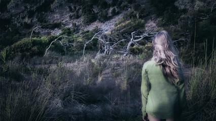 Girl looking at fairy trees. Horror, mysticism. Dalyan, near Mediterranean Sea, Mugla Province, Turkey