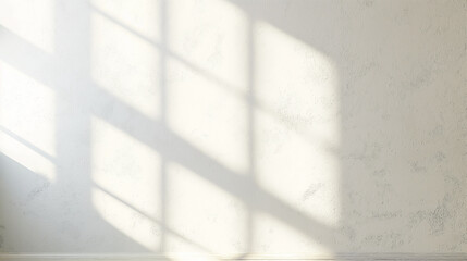 White interior wall texture with shadow of window panes cast onto surface A window pattern projected onto a plain, flat white wall.