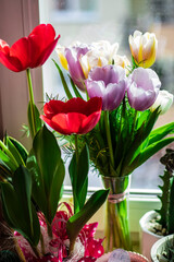 Beautiful tulip flowers outside the window