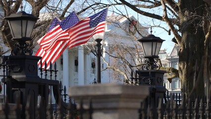 US flags on a post outside the presidents White House in Washington, DC.