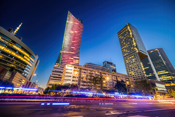 Warsaw in the evening with light trails of passing cars