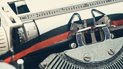 Vintage typewriter with with empty paper