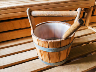 Wooden Sauna Bucket With Ladle Inside Sauna Room