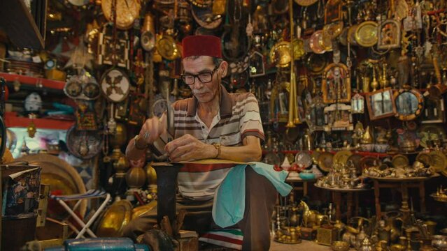 Morocco Man in a Store with Brassware