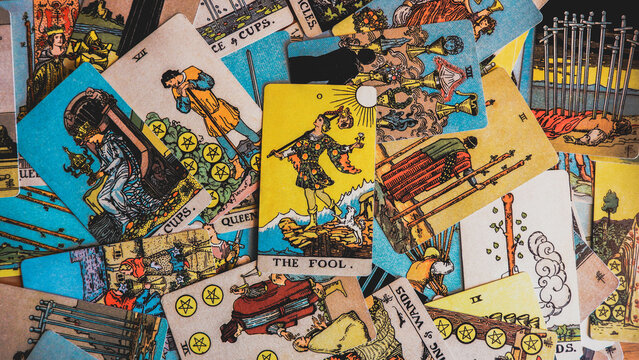 Malm&ouml;, Sweden - April 1, 2024: The Fool Major Arcana Tarot Card Rider Waite Smith. Spiritual altar, Divination tool, witchcraft, healing crystals, fortune telling cards, cartomancy.
