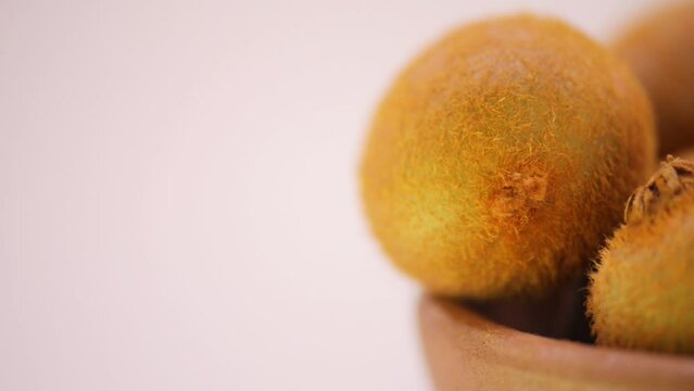 several ripe kiwi in plate