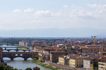 Fototapeta na wymiar Panoramic view of Florence with the Arno River and multiple bridges, encapsulating the essence of this historic Italian city.