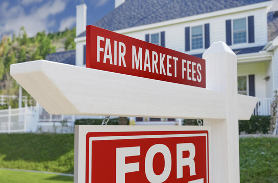Fair Market Fees For Sale Real Estate Sign In Front Of New House.