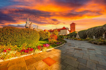 Golden Hour Sunset Over Historical Krakow Gardens and Architecture