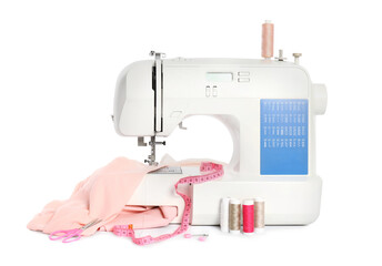 Modern sewing machine with pink cloth and craft accessories isolated on white