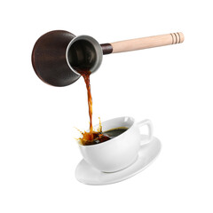Pouring freshly brewed aromatic coffee from turkish pot into cup. Objects in air on white background