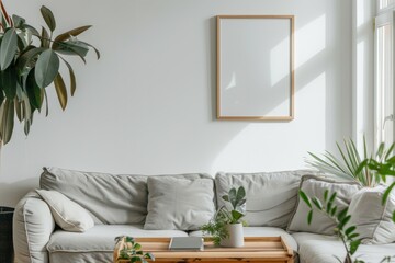 A picture frame hangs above the couch in the living room
