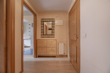 Entrance hall to home with armored oak wood door, beech shoe rack and mirror with metal wrought...