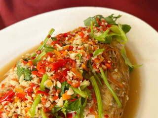 thai fried fish with spicy sauce, thai food.
