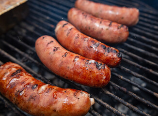 sausages on grill