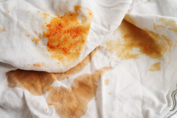 Dirty tomato sauce stain or ketchup on cloth to wash with washing powder, cleaning housework...