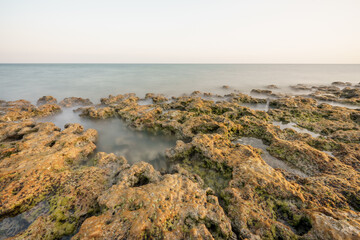 Fototapeta na wymiar Long exposure nature landscape rocks by water Florida Keys