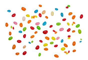 Falling colorful jelly beans, chewy jelly beans isolated on a white background.