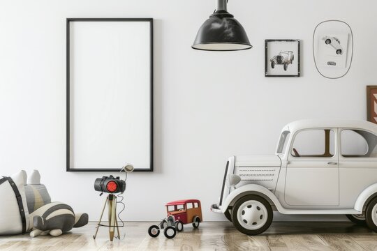A white car with wheel design is parked next to a picture frame