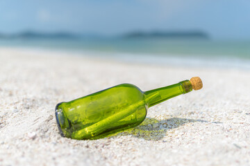Message in a bottle (MIB) on a sand beach - 772726930