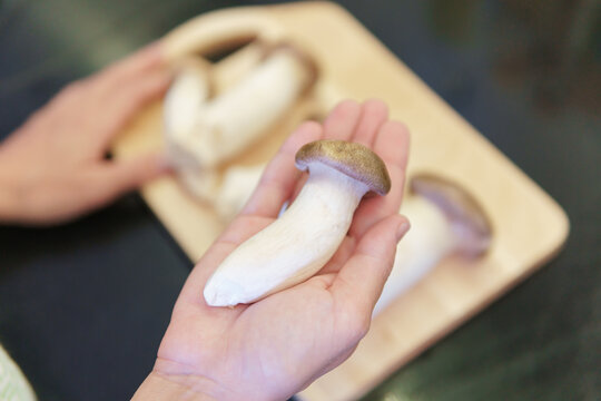 Cooking Pleurotus eryngii. View of king oyster mushrooms