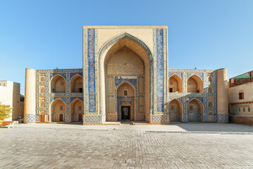 Facade of the Abdulaziz Khan Madrasah in Bukhara, Uzbekistan - 772728114
