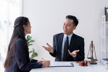 Lawyer consulting with client in office. Legal advice and services, attorney-client consultation. Law, legal solutions, and client support concept.