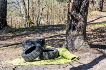 Discarded car tires in nature, environmental pollution