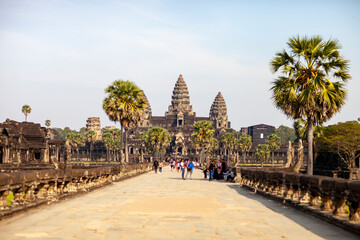 Stone Bridge At Large Towers At Angkor Wat Temple Complex. Angkor Wat Is A Temple Complex In...