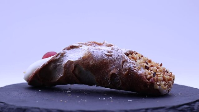 Sweet cannolo siciliano. Sicilian cannoli filled with ricotta cream. Traditional South Italy dessert