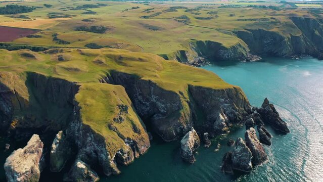 St Abbs Head from Above: Cliffs, Rocky Coastline, and Lighthouse, Scotland Coast, United Kingdom.