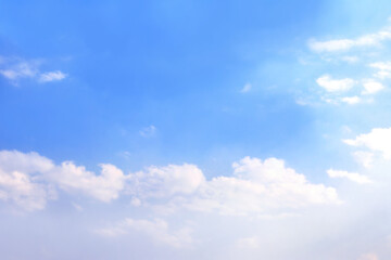 White clouds in the blue sky. Beautiful nature scene. Copy space for text