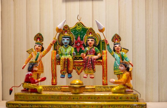 Wooden Art, Hindu god ram idol made on wooden with hand work and filled with natural colours on display. Selective focus on object.